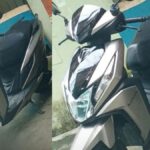 moto Honda Elite prata.